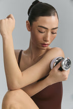 Model using Cavi Spa RF Core Plus on her upper arm
